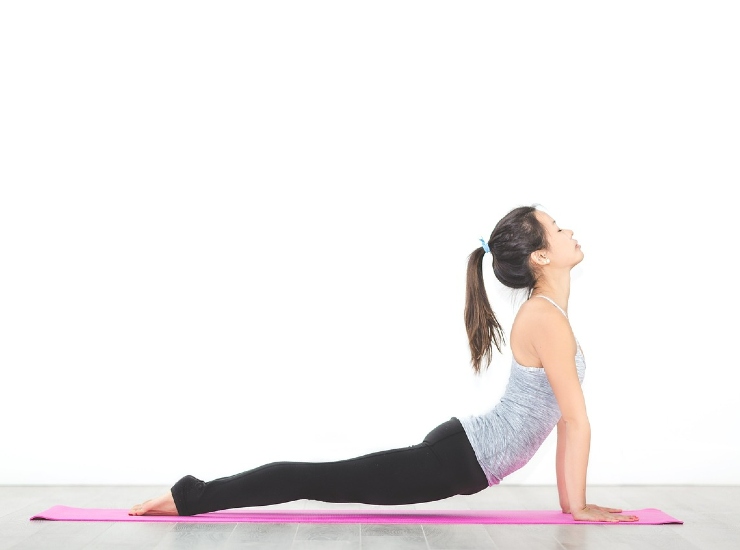 Yoga benefici: riduzione pressione sanguigna